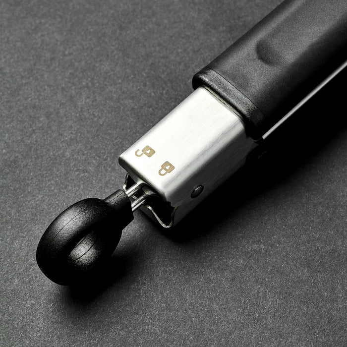 A closeup of the end of HexClad tongs.