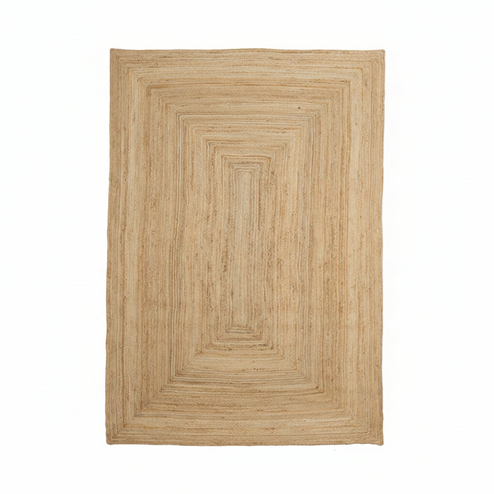 A beige braided jute rug with a natural texture, suitable for high footfall areas.