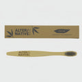 Bamboo toothbrush with 'Alter/native' branding on a white background