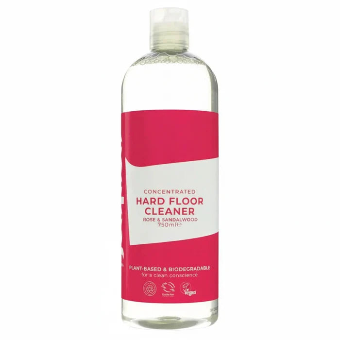 A 750ml bottle of Hard Floor Cleaner concentrated liquid, featuring a clear bottle with a white and bright pink label, set against a plain white background.