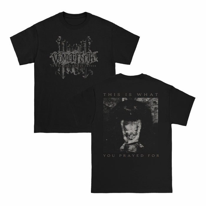 Black printed t-shirt by Vomit Forth with gothic logo on front. Made on Comfort Colors fabric; back features a dark, grainy image of a person with obscured face and the text THIS IS WHAT YOU PRAYED FOR above and below the image.