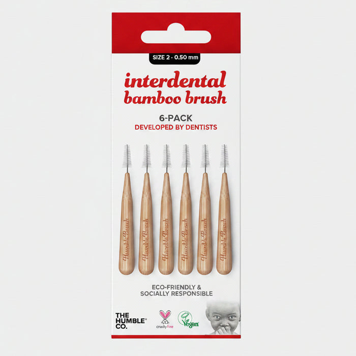 Packaging for Interdental Bamboo Brush by The Humble Co., featuring six brushes with bamboo handles and nylon bristles, designed for dental use.