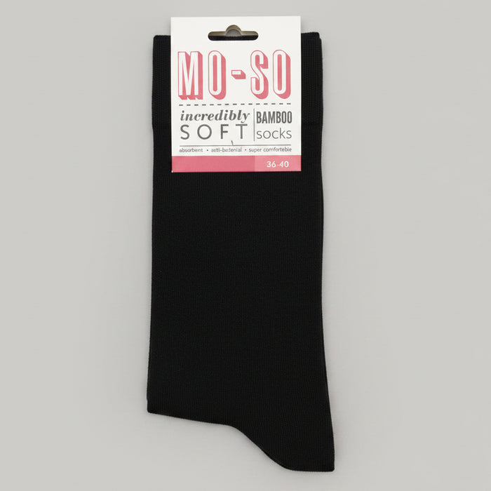 pair of black socks branded mo so on white background