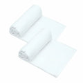 Two white baby swaddles arranged on a plain grey background.