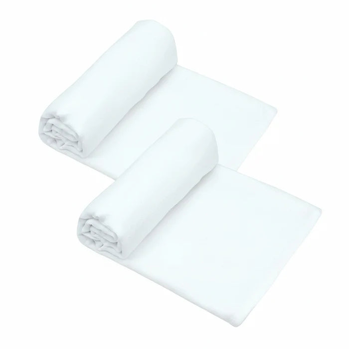 Two white baby swaddles arranged on a plain grey background.