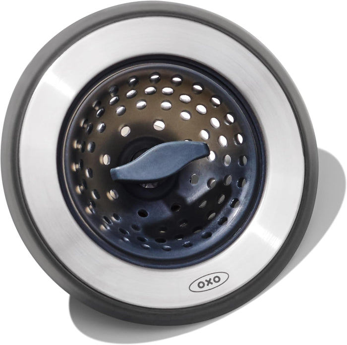twist-to-switch tab that toggles between strainer and stopper modes