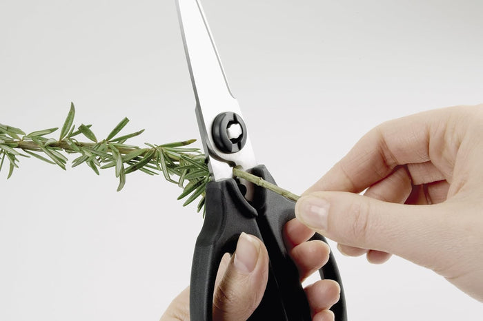 integrated herb stripper built into the handle for removing leaves from tough stems