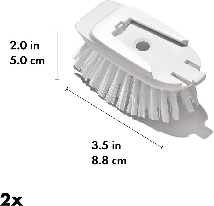 integrated scraper on the back of the brush head for baked-on food