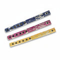 Three colorful wooden flutes on a white background