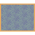 A blanket with geometric pattern in light green on a muted purple background, enclosed in a thin orange-brown wooden frame.