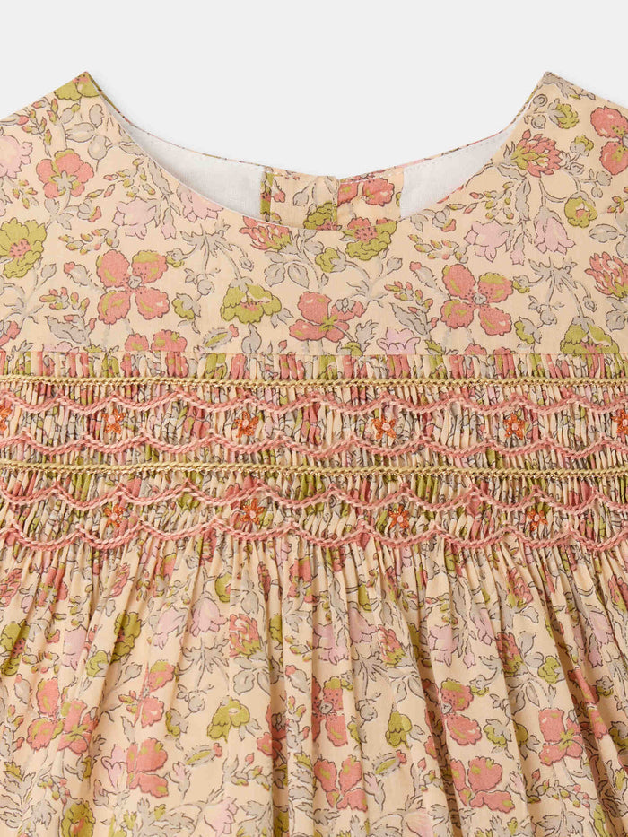 Robe bébé Maruska en tissu Liberty smockée et brodée main en coton biologique