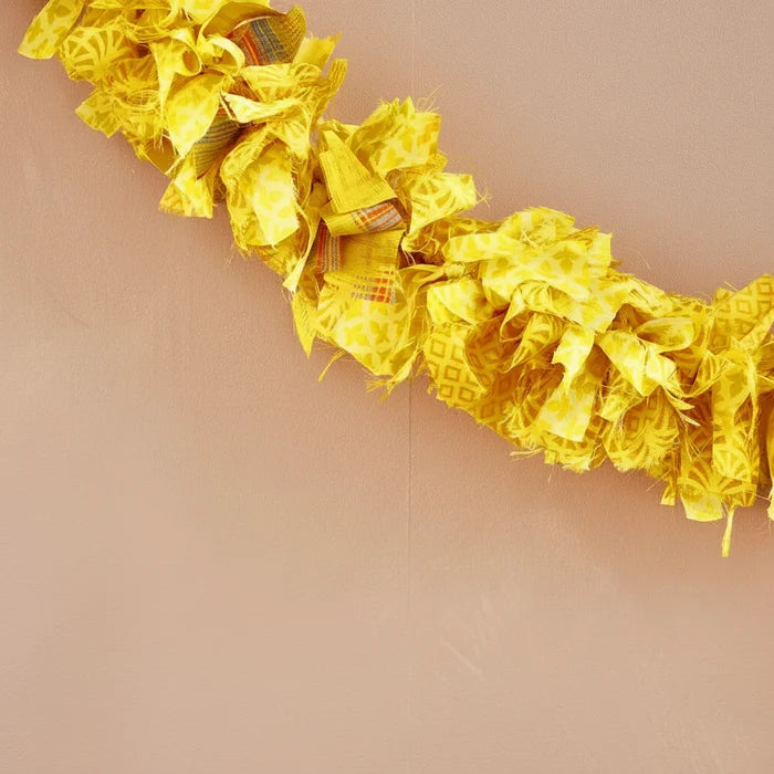 Decorative yellow fabric garland