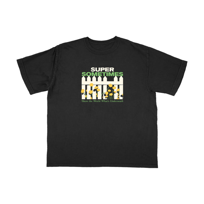 Black t-shirt from Super Sometimes featuring "SUPER SOMETIMES" above yellow and white silhouettes, plus "Show the World Worth" in smaller text. A bold printed tee for your collection.